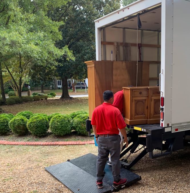 moving-company-crew-placing-furniture